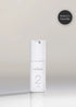White skincare bottle labeled &