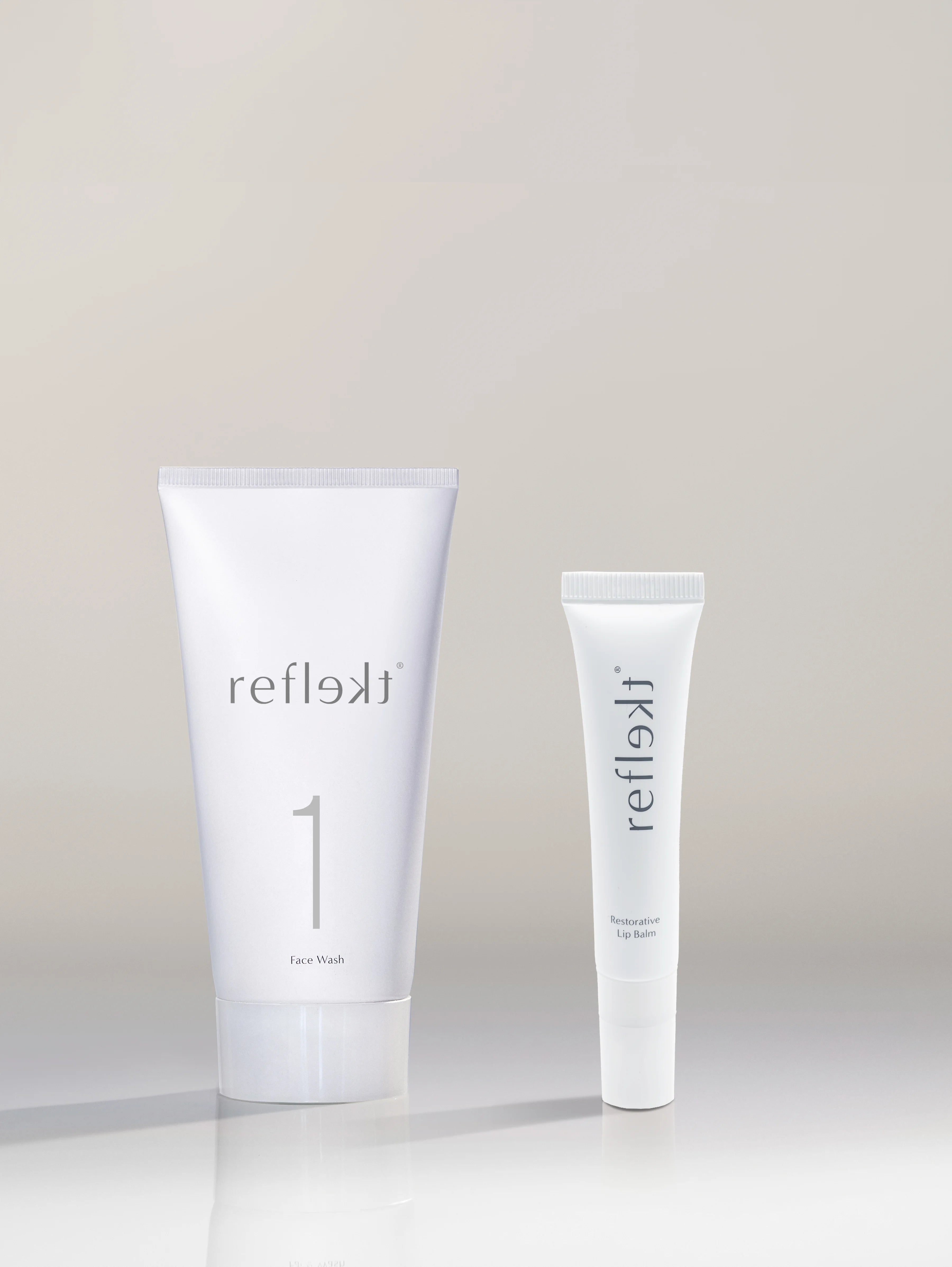 Two white tubes labeled &
