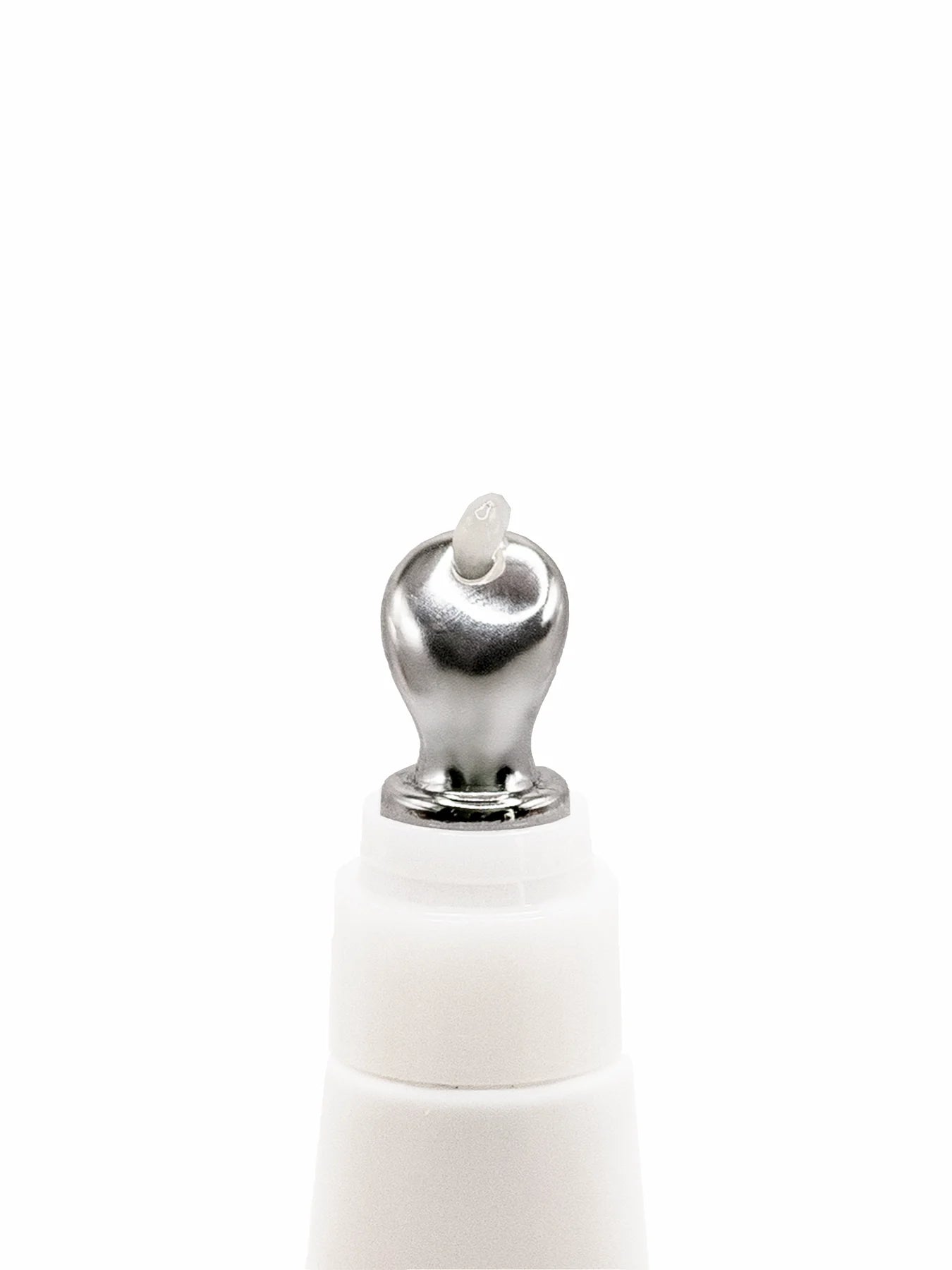 White bottle cap with silver top on a white background