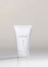 White skincare product tube labeled &