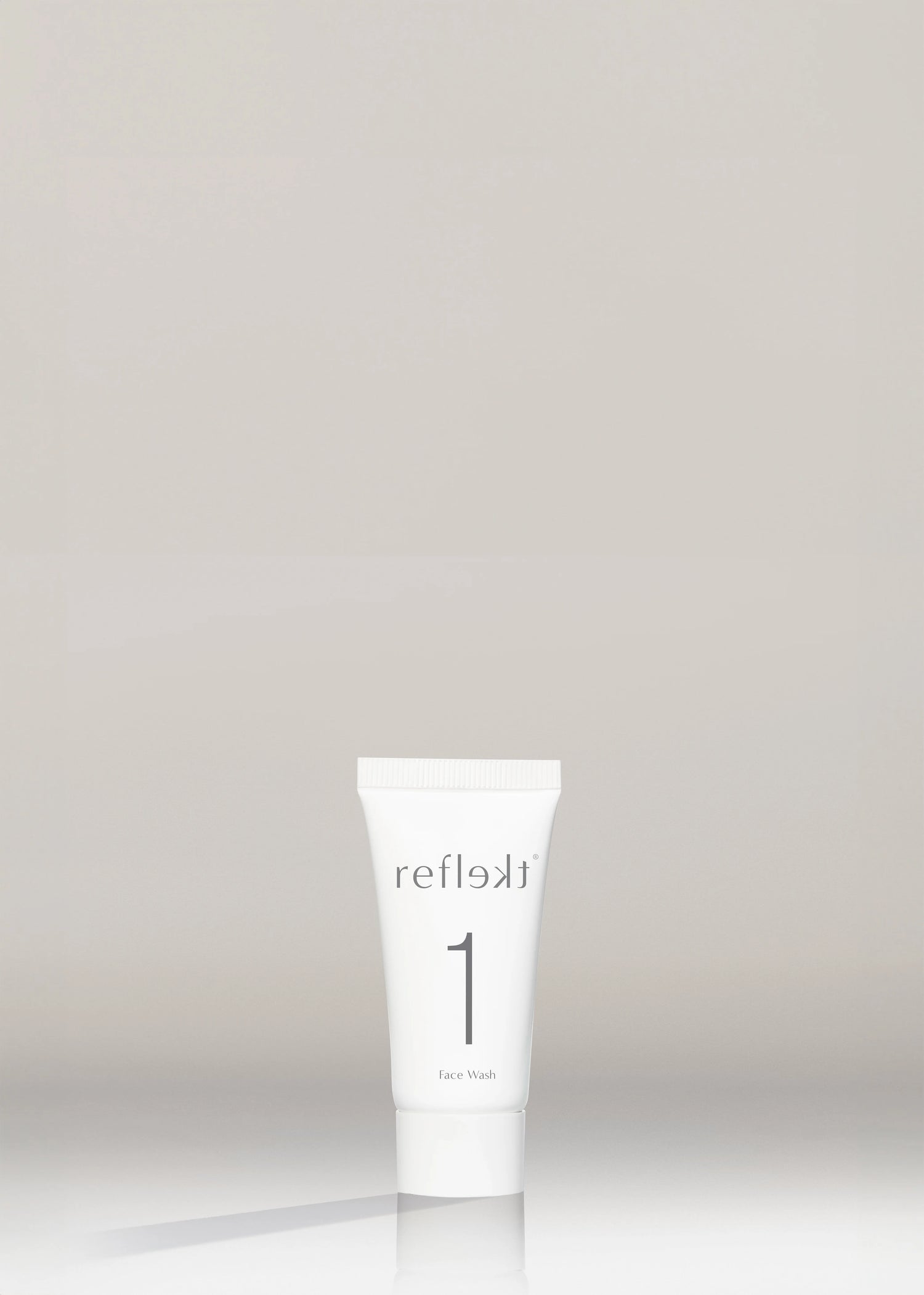 White tube labeled &